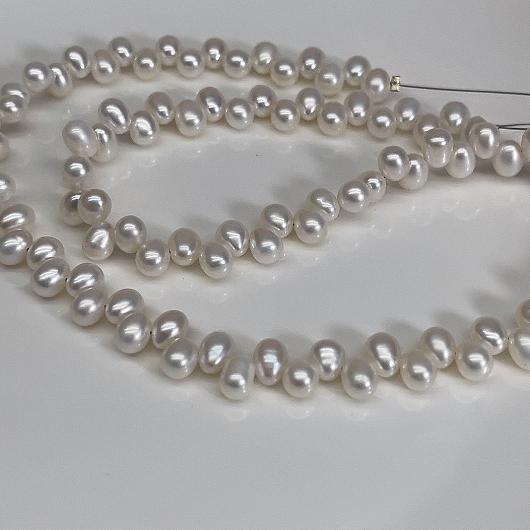 亲****淡水珍珠银S925镶嵌项链