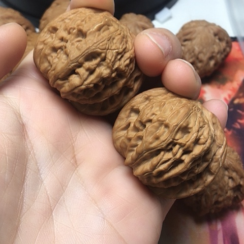 文玩核桃把件磨盘狮子头