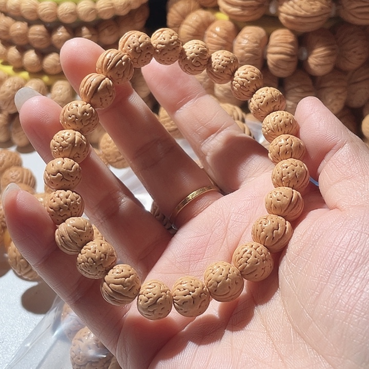 丽***凯吊坠桃核桃核手串野生84