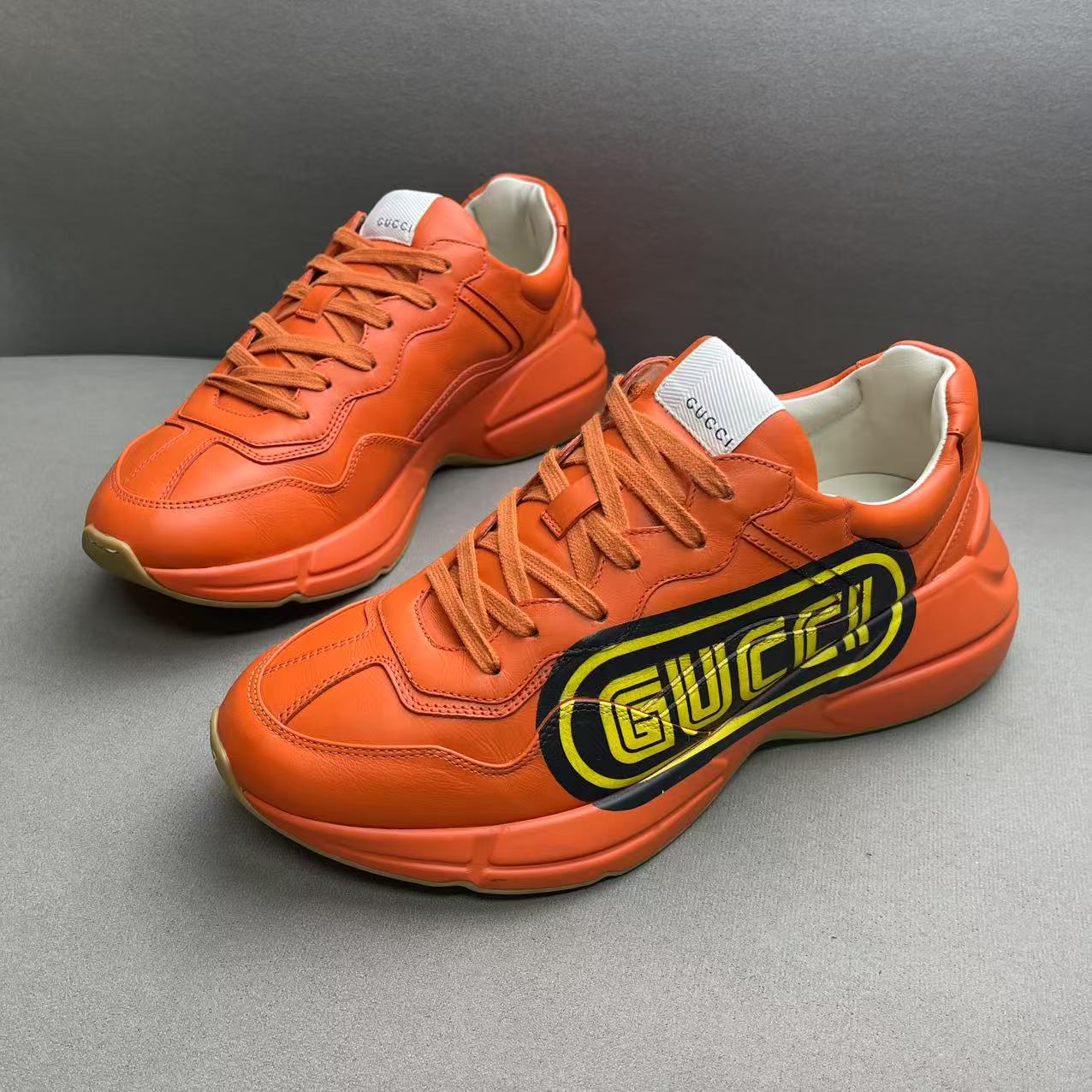 95新 GUCCI/古驰 橙色皮面侧边大logo时尚百搭老爹鞋 41.5码