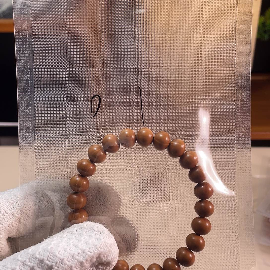 D***.猴头核桃雕刻算盘珠