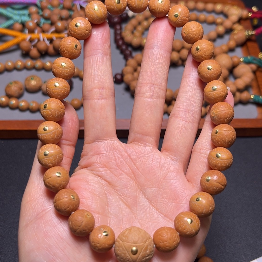 凤眼菩提吊坠12+mm2025精品铜钉手持