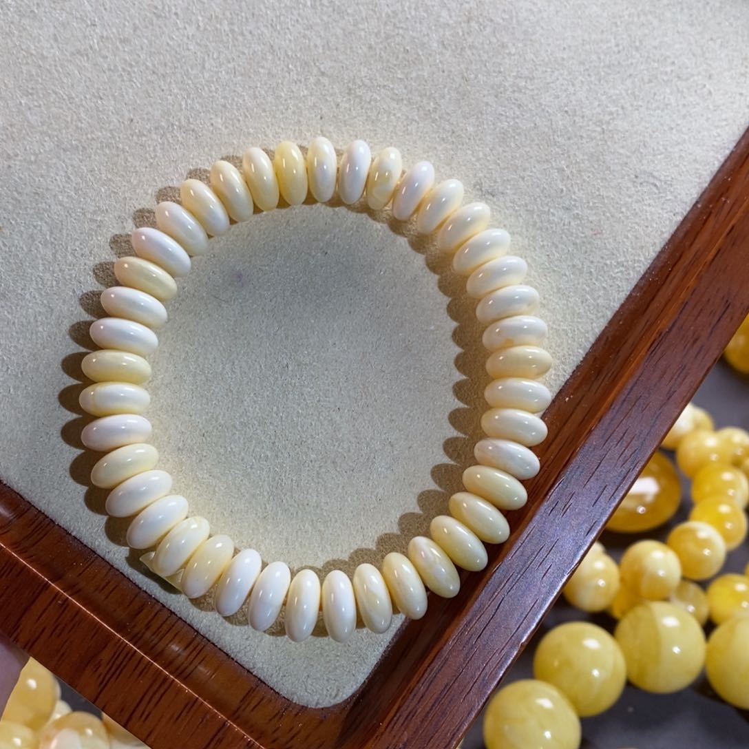 琥珀裸石未镶嵌10mm瓷白飞碟手串