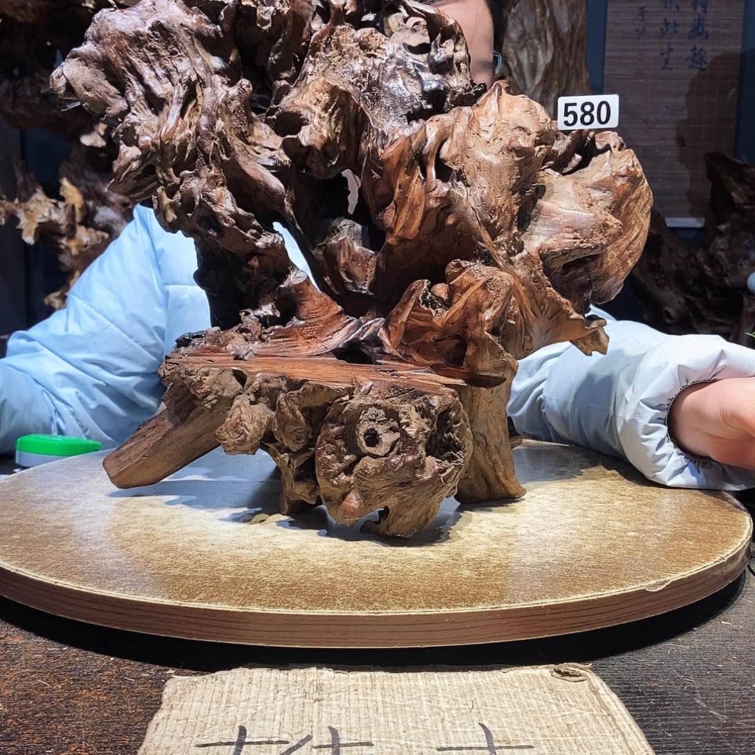 刘***子580株木随行的小根艺