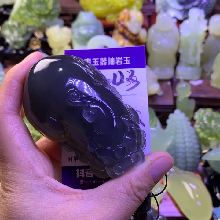 浪***间岫玉未镶嵌手把件