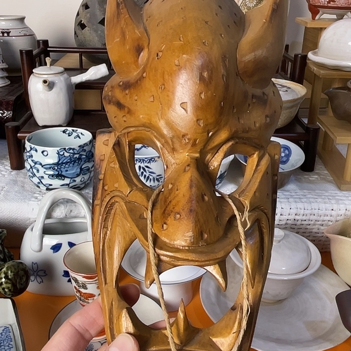 晚***人瓷片木头面具不错的哦