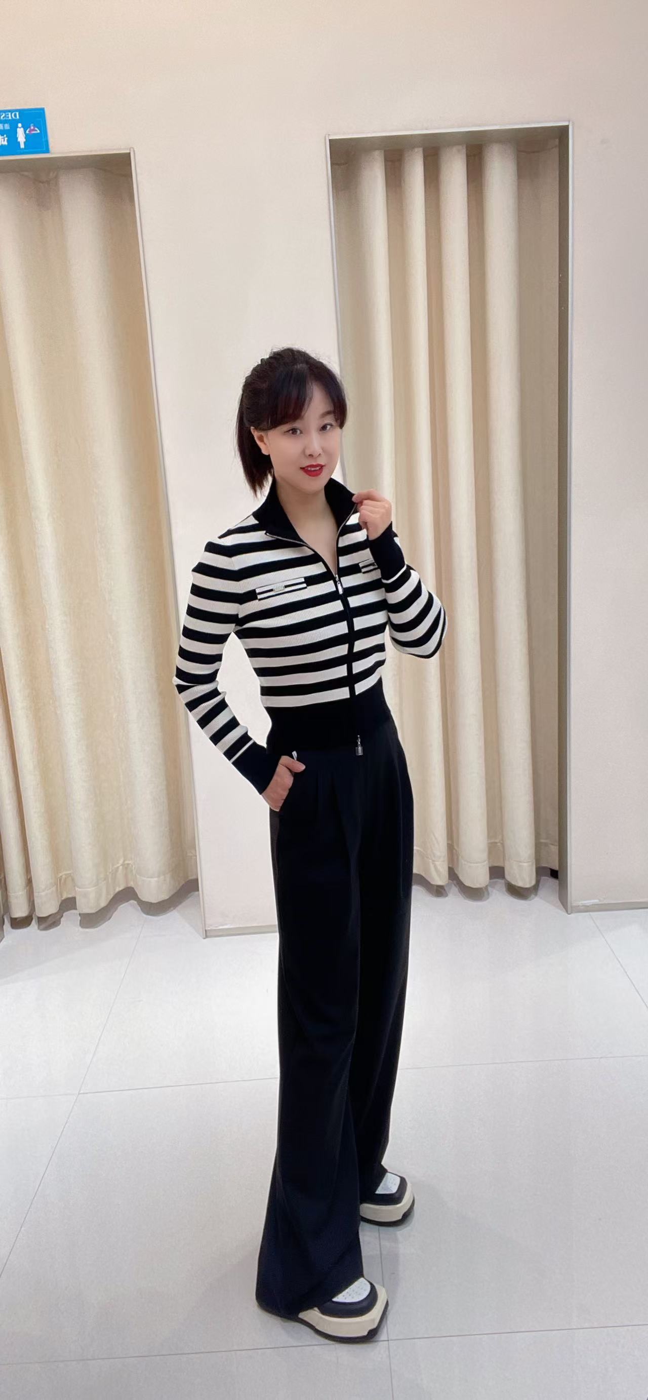 艾家黑色款长裤子