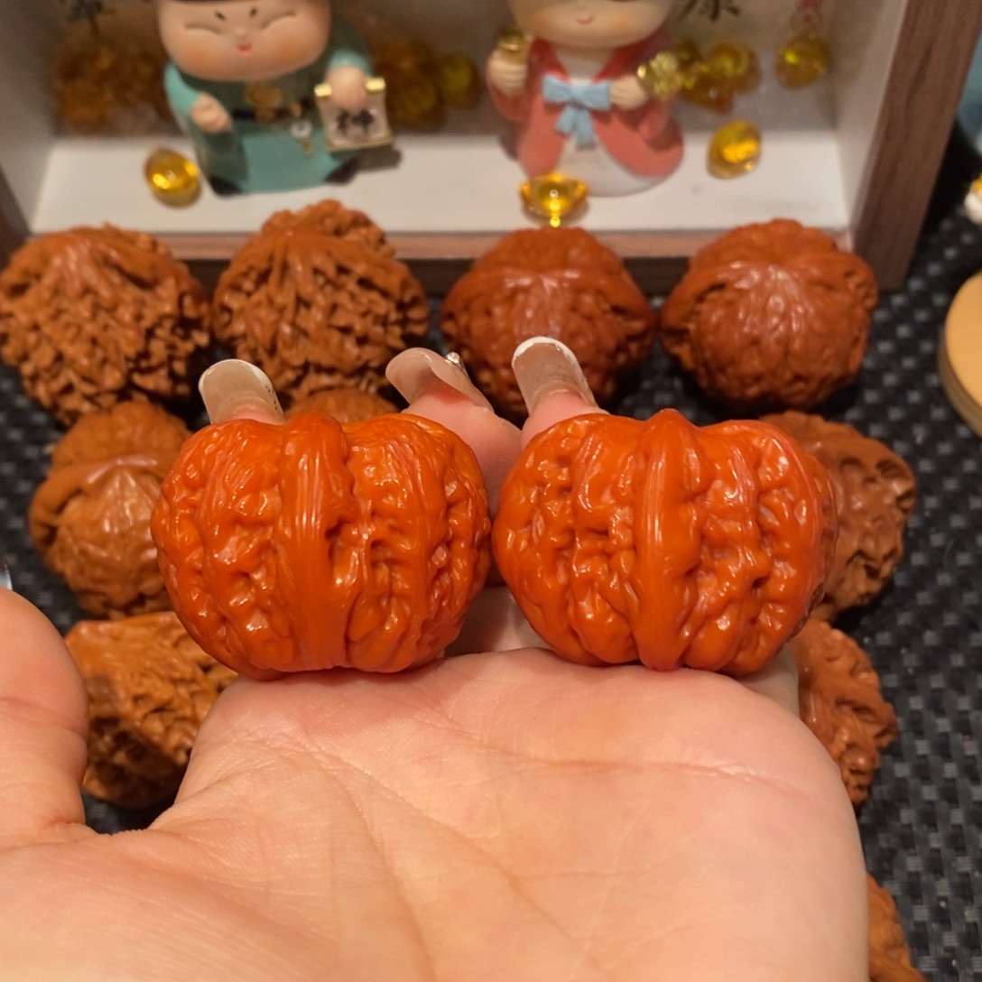 孙***。桃核吊坠40玉化元宝，1431