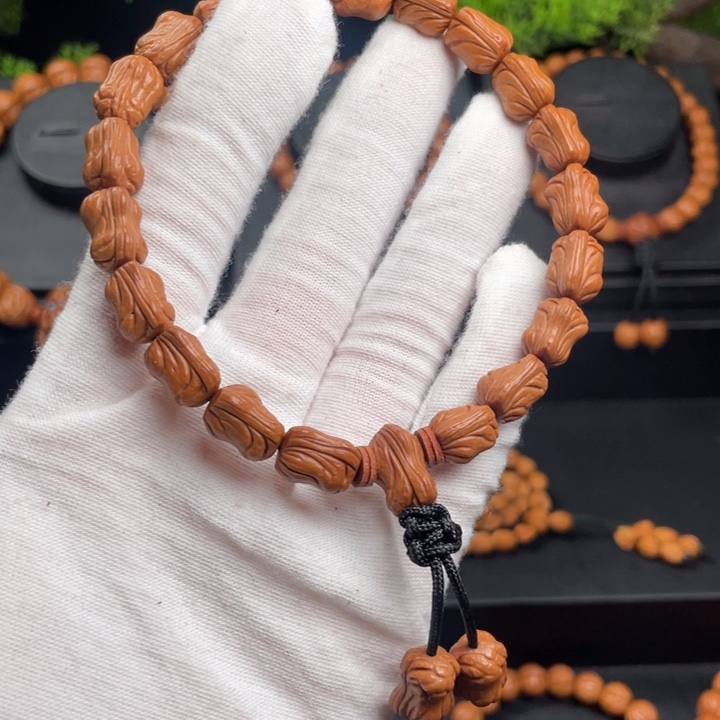 胡***哥木质类精品桃核手持