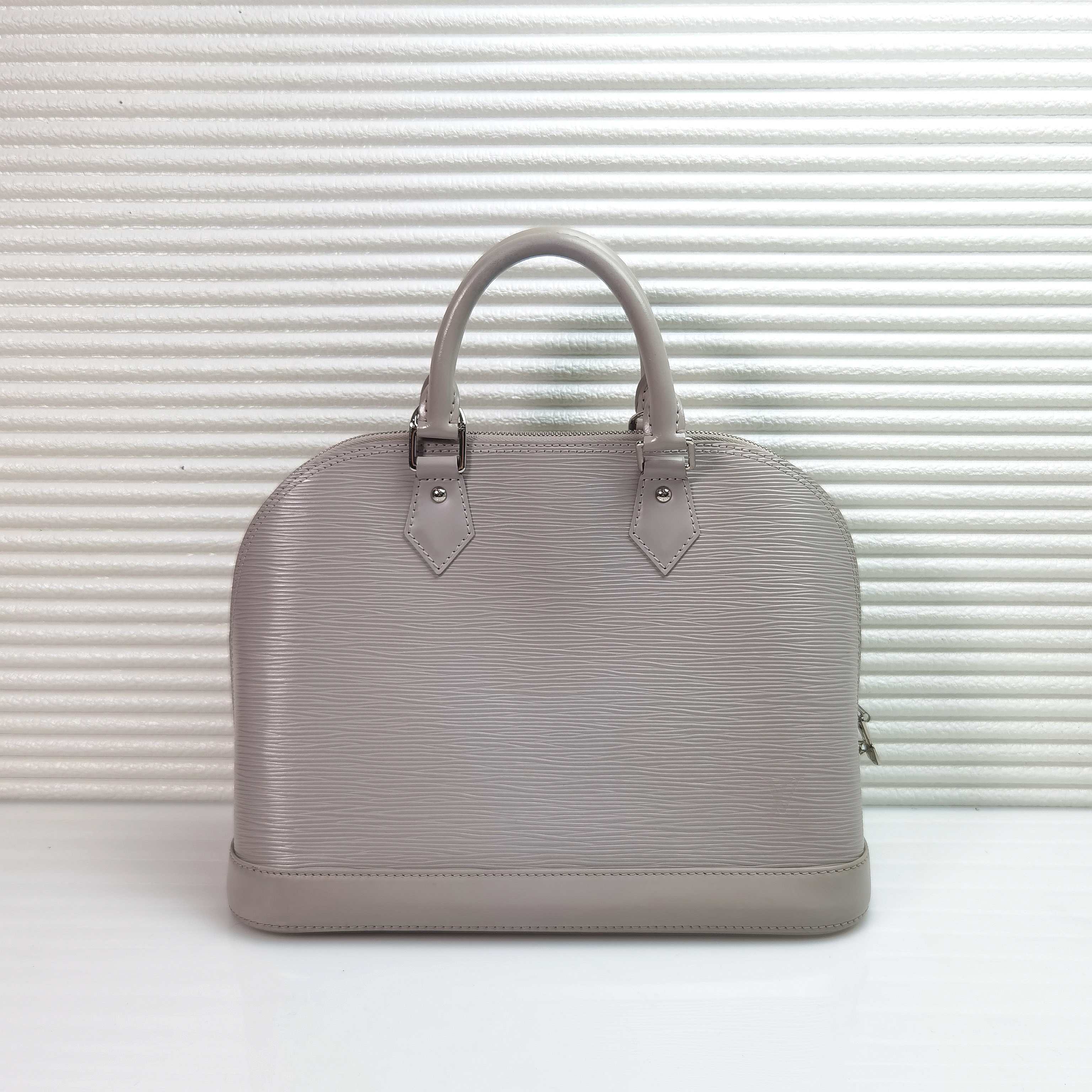 99新 LouisVuitton/路易威登 LV alma 水波纹贝壳手提包斜挎包