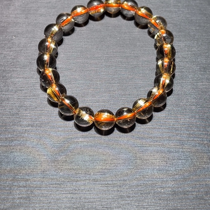 姜***炜发晶手串未镶嵌金钛晶