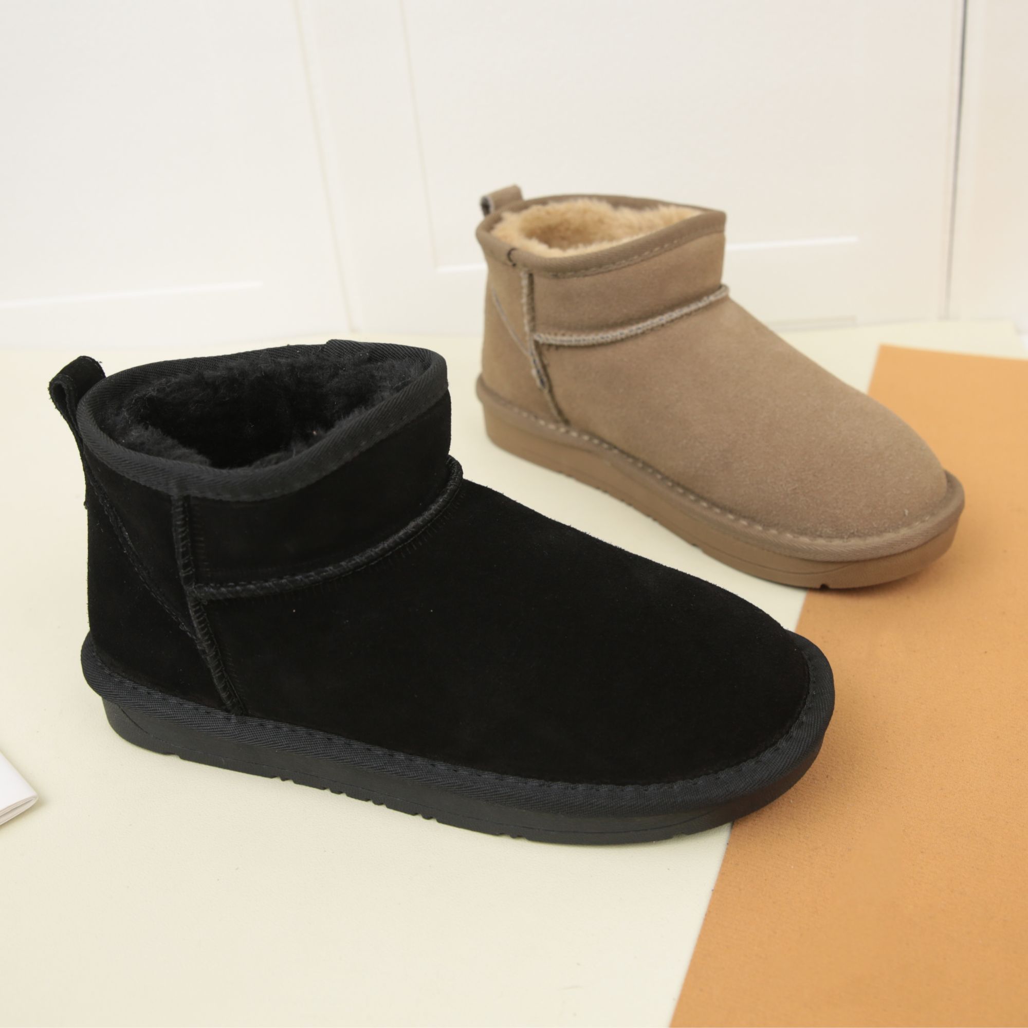 6112冬季新款真皮短筒雪地靴女鞋低跟保暖加厚雪地棉百搭加绒女靴