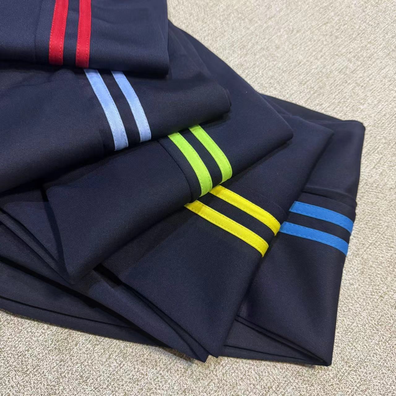 新品南韩丝面料春秋款藏蓝色双红条多色条男女同款校服直筒裤舒适