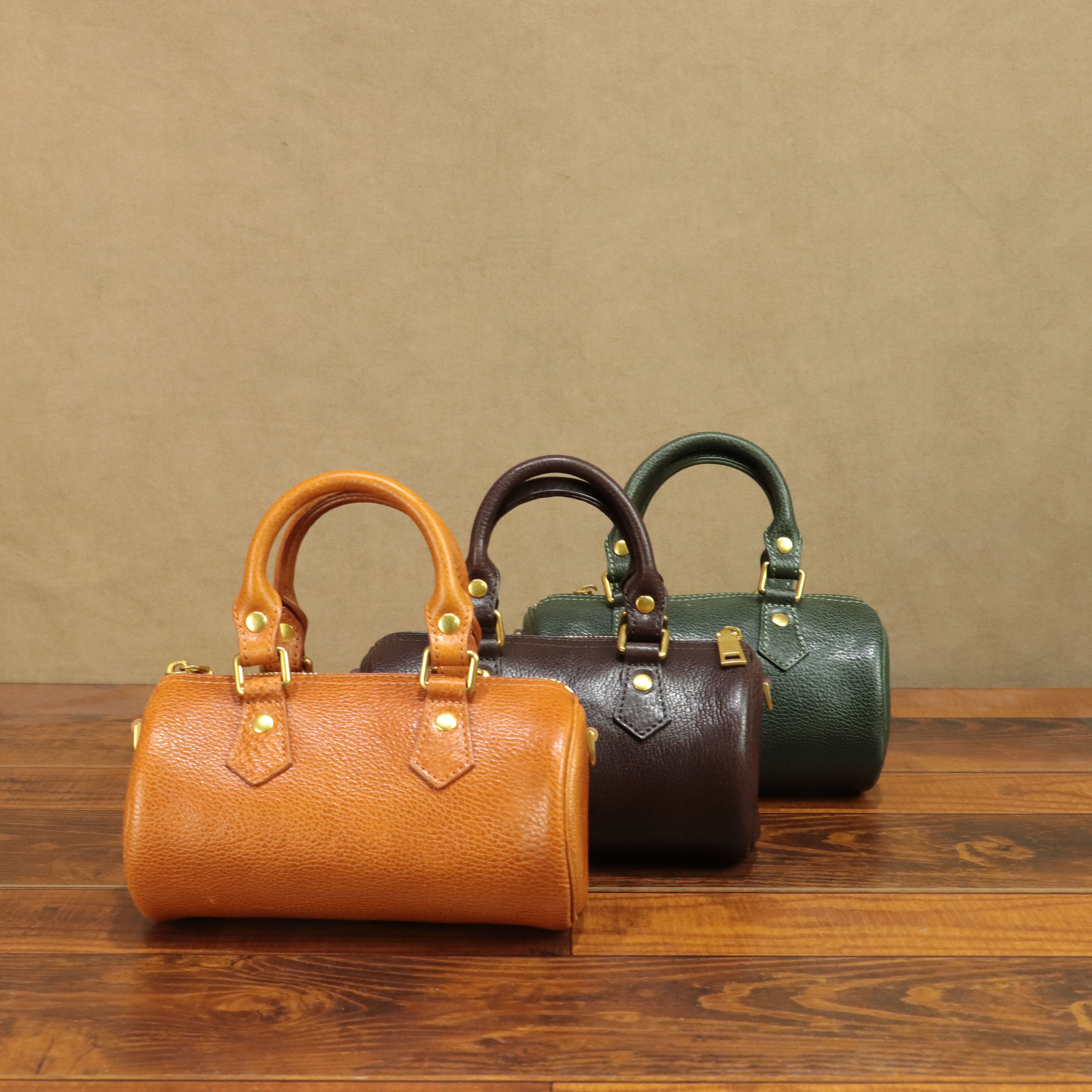 头层植鞣牛皮真皮女士单肩斜挎手提巴比龙波士顿包包