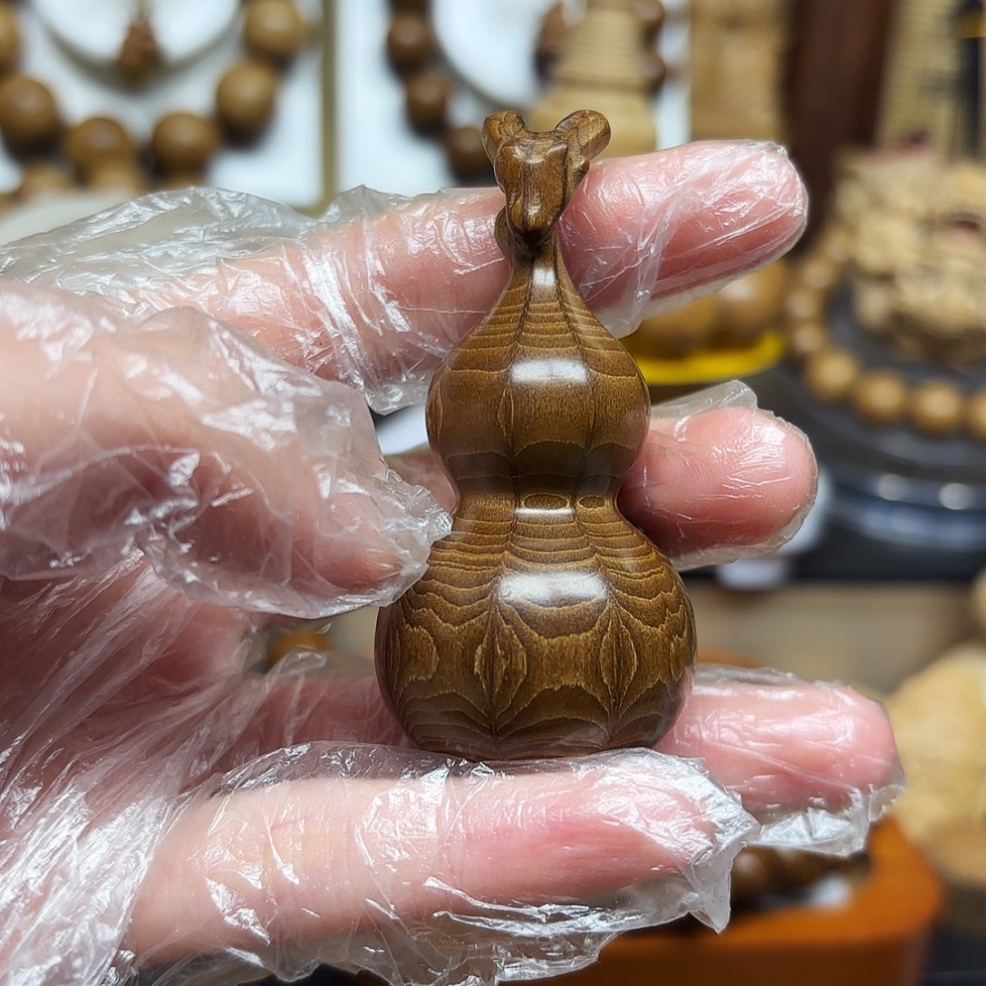 隔***²九道木龙头葫芦手把件