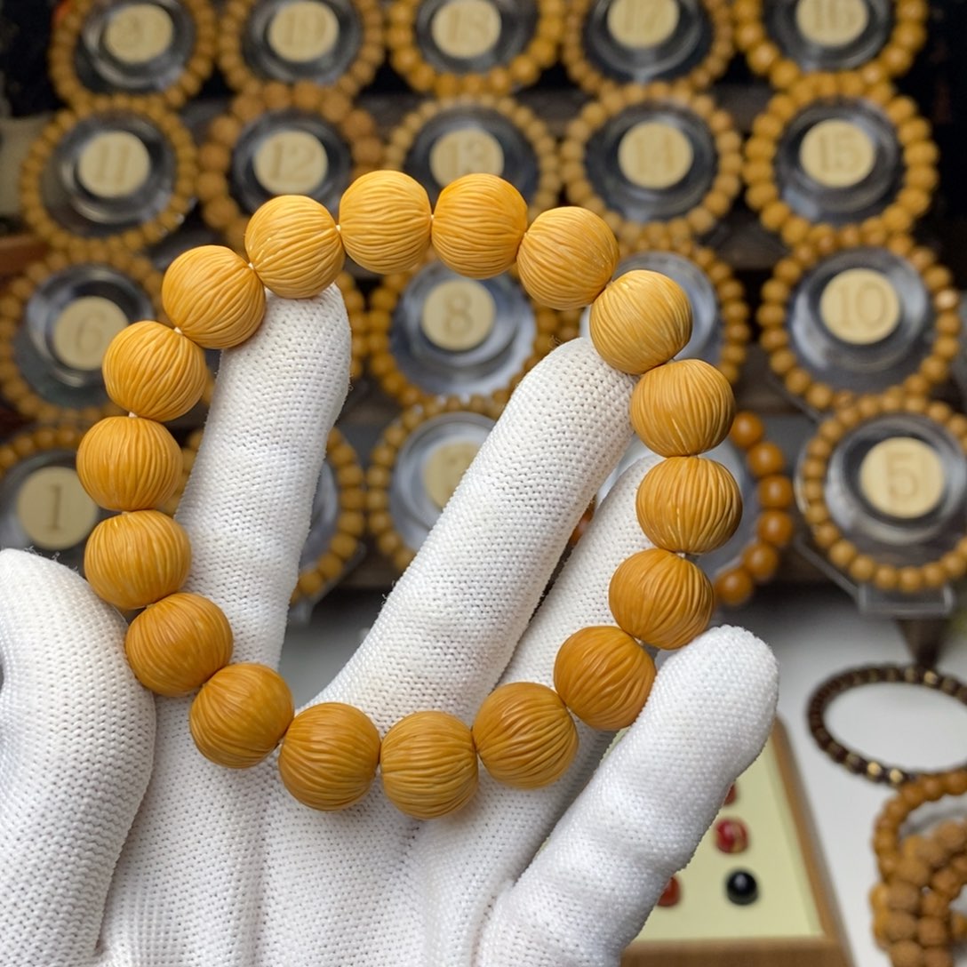 孤****猴头核桃吊坠金丝