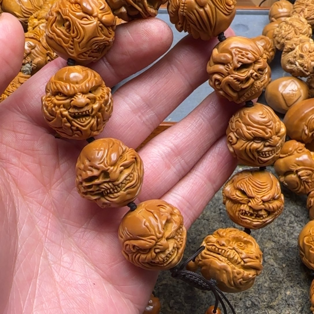 橄榄核吊坠向死而生