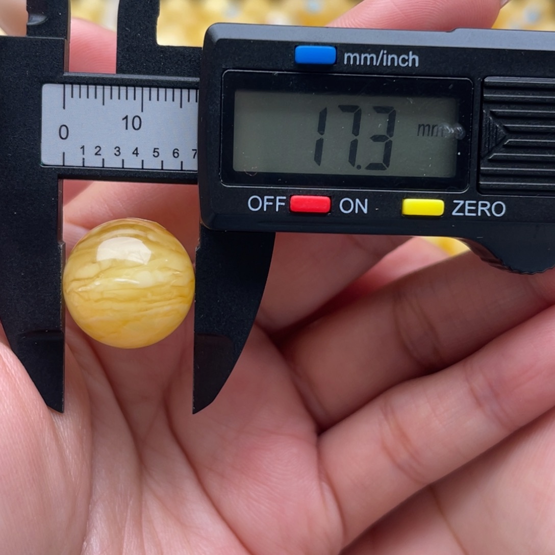 扶****琥珀未镶嵌裸石蜜蜡圆珠微瑕笑