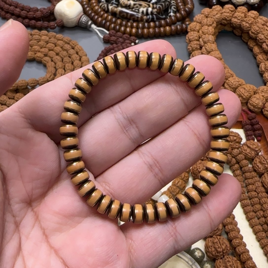 橄榄核手串核壁镶嵌7.3×4.1mm