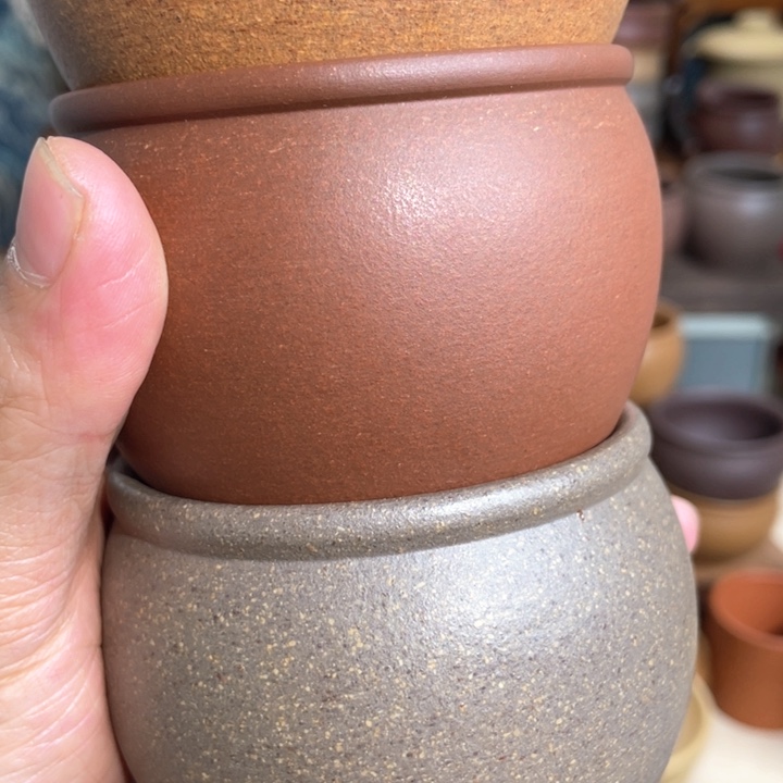 紫砂茶杯心***?1223354788965554858