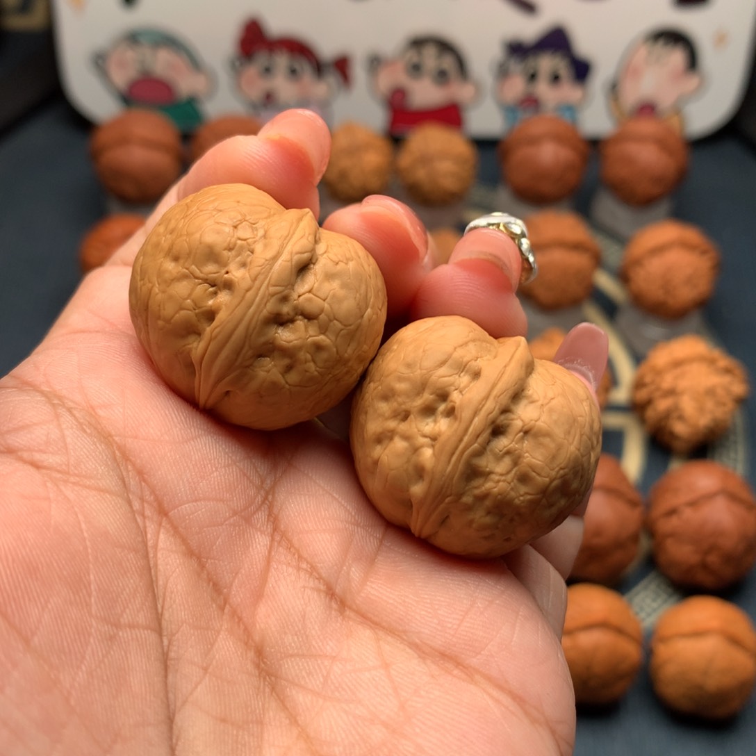 文玩核桃把件金锭元宝