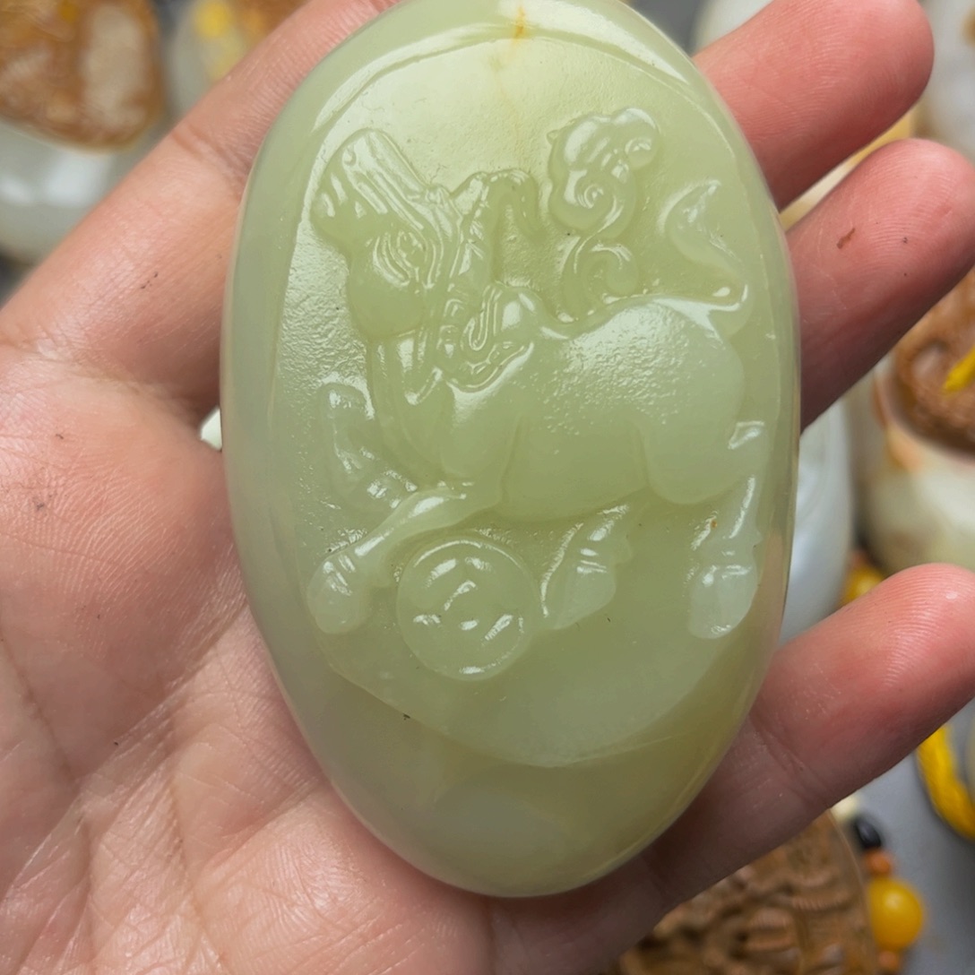 狂***雨石材方解石手把件牛