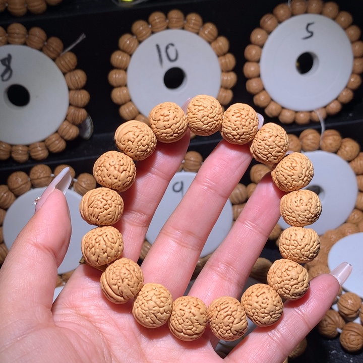 桃核手串虎皮，肌肉