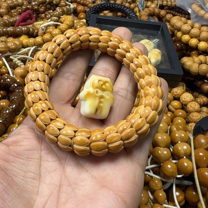 浮***光猴头核桃手串莲花