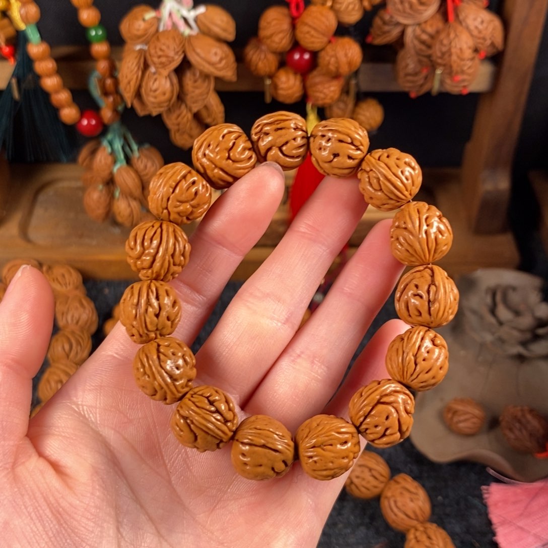 吊坠桃核桃枭手串