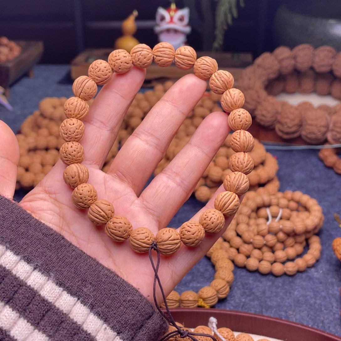 y***z文玩核桃手串桃核