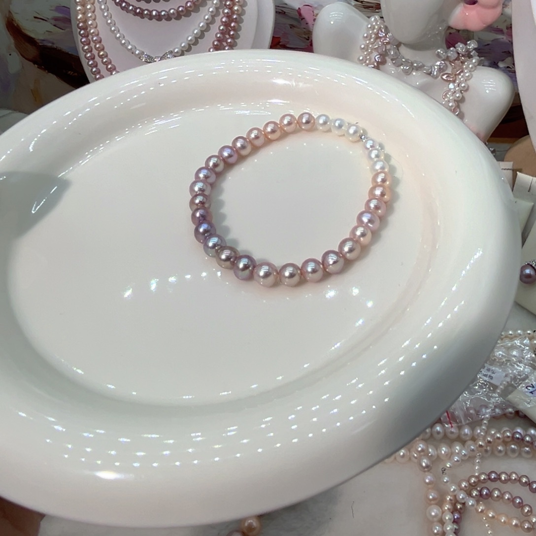 冰***糖5.5左右近圆极光天然珍珠银S925镶嵌淡水珍珠