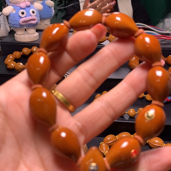 刘****橄榄核手串/手链三花手串