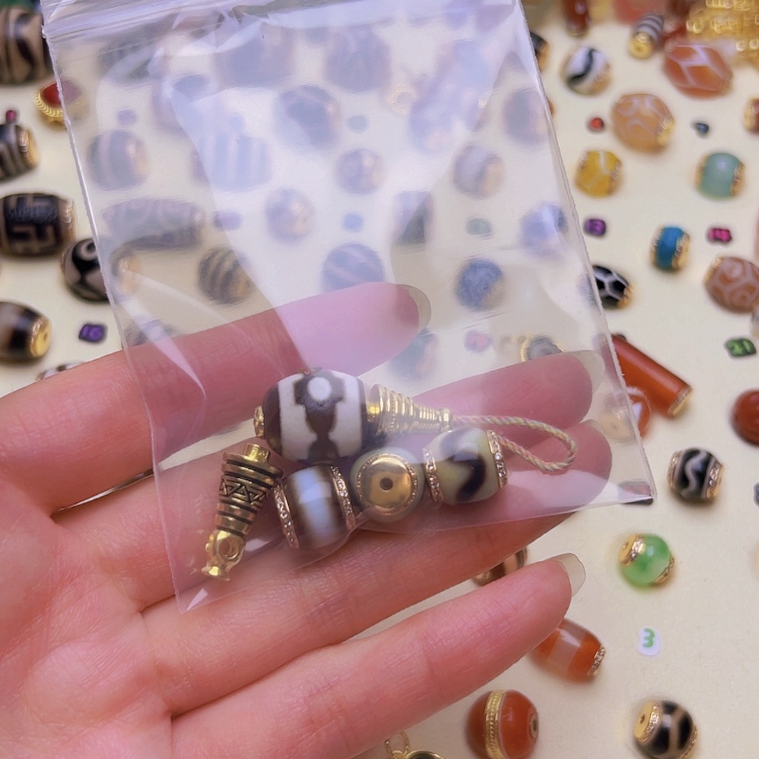 魏***、玛瑙/玉髓未镶嵌单珠