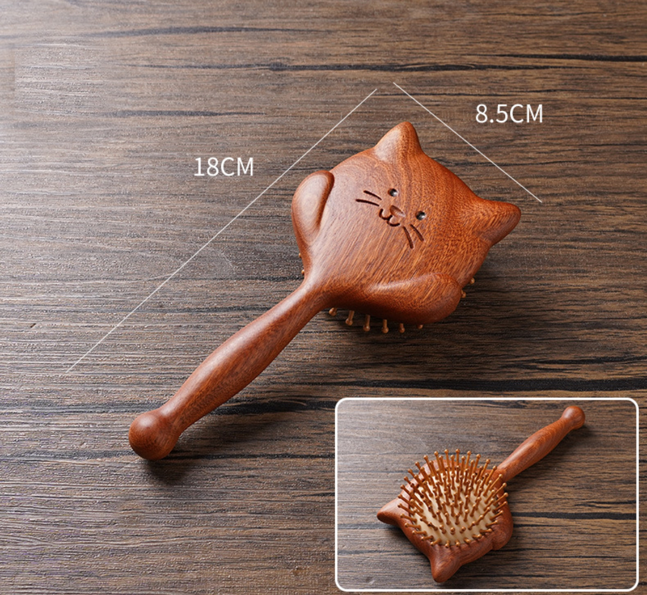 乌檀木卡通猫猫按摩梳木梳