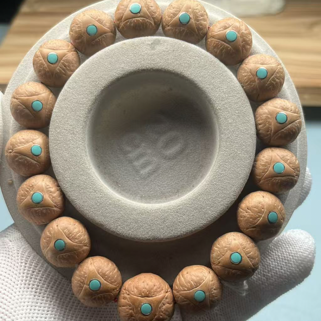 尼泊尔龙眼菩提精挑手串(货头尺寸15mm升级版精工镶嵌蓝彩钉）