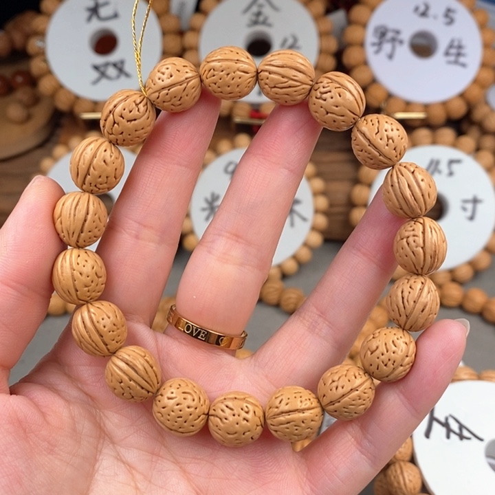 桃核手串凤羽12.5qzzg尺寸误差0.5之间