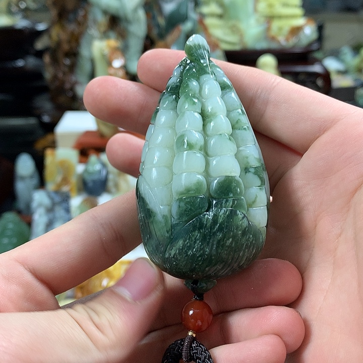 蛇纹石玉手把件合金