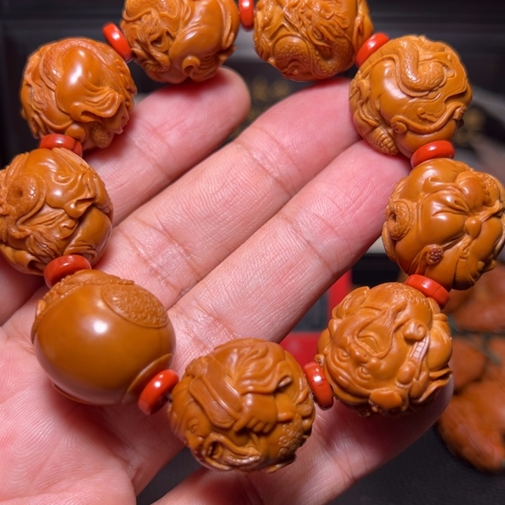用***0橄榄核手串九龙财神