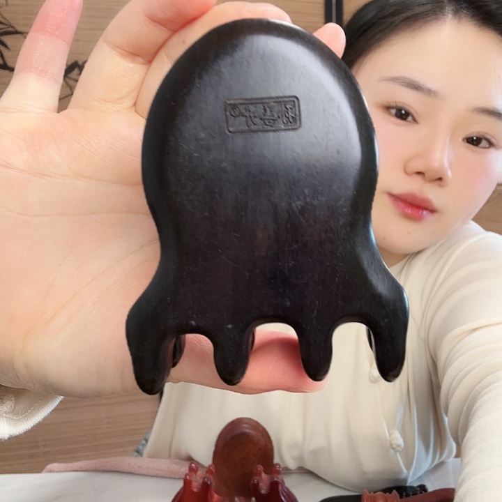 紫光檀手部按摩瑕疵