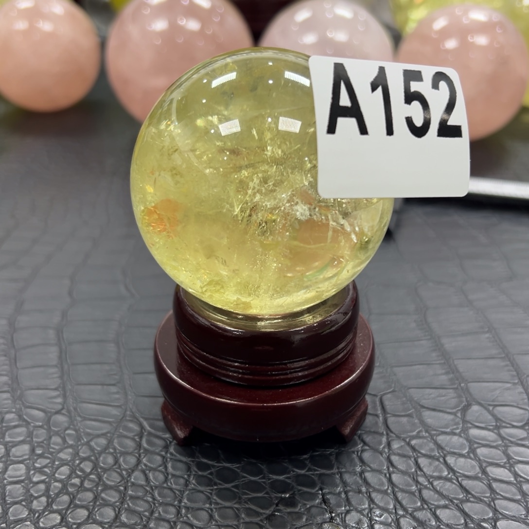 是***呀石材天然黄水晶球6.4