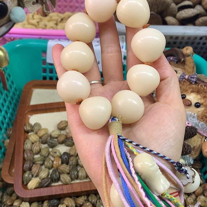 千眼菩提吊坠白色佛心果手串