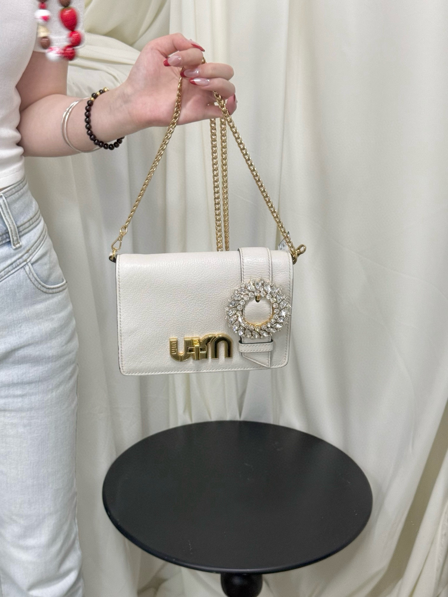 95新 MIU MIU/缪缪 miumiu 白金太阳花水钻链条斜挎包(K)
