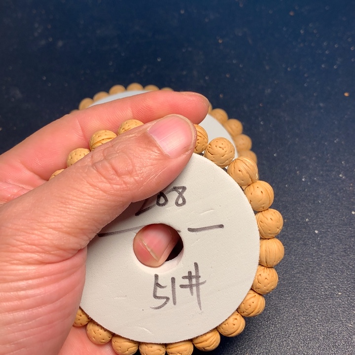 桃核手串51号健健康康了