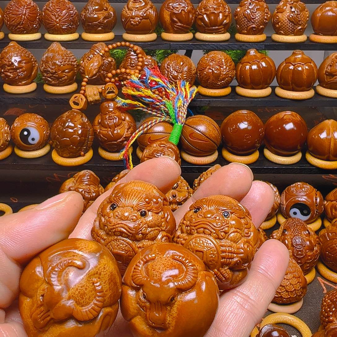 郭***店橄榄核手串/手链貔緧一对，牛转乾坤一对