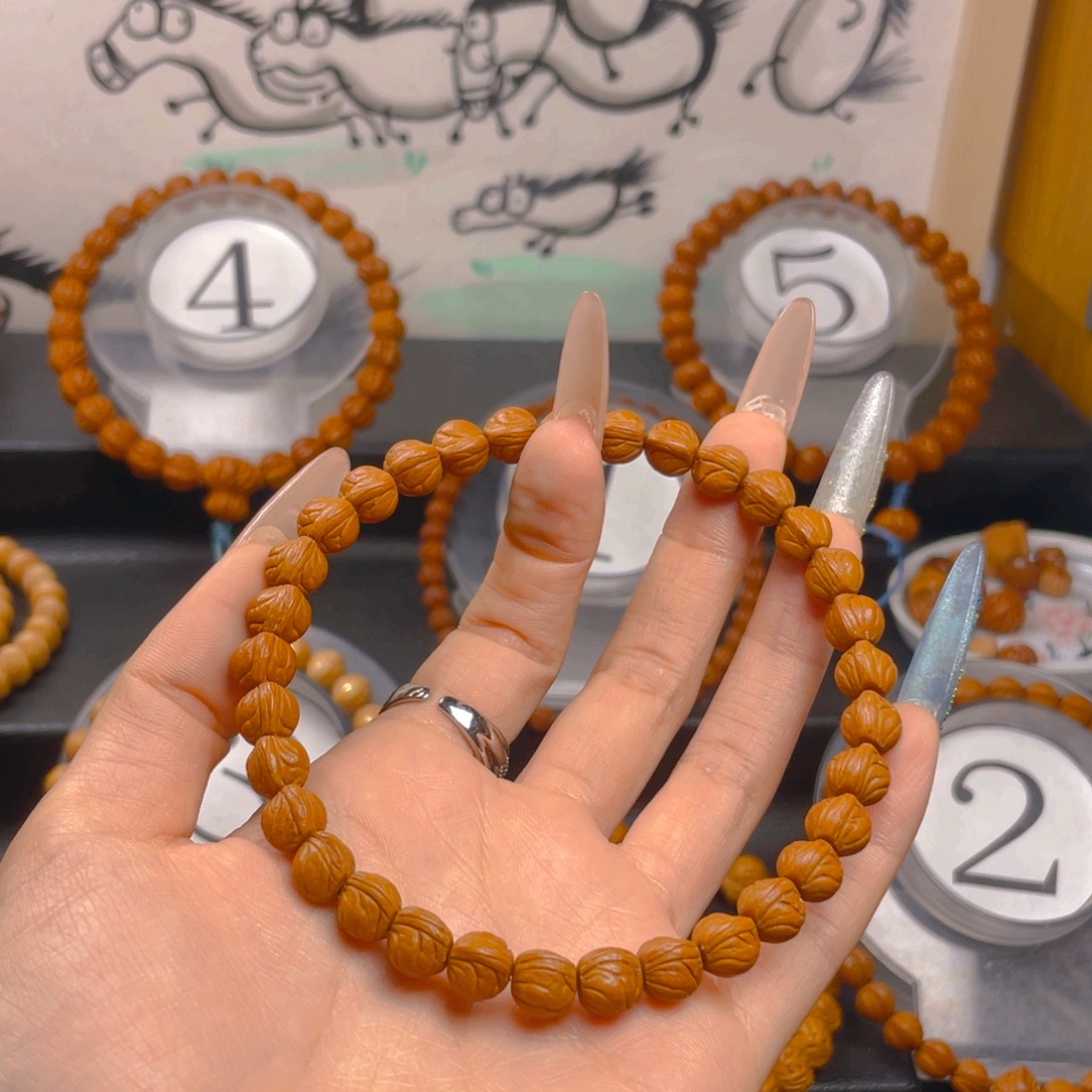 啷***浪吊坠桃核0.8888888888888