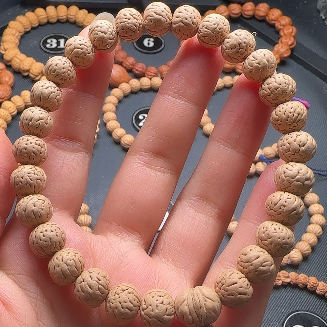 手串桃核磨盘脐中脐