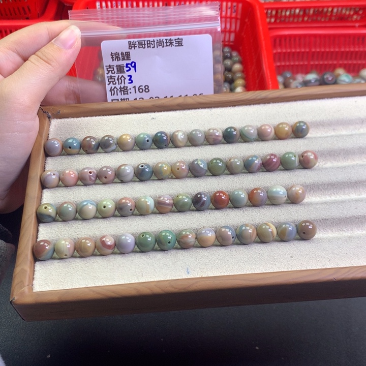 锦***鲤石英质玉未镶嵌手串