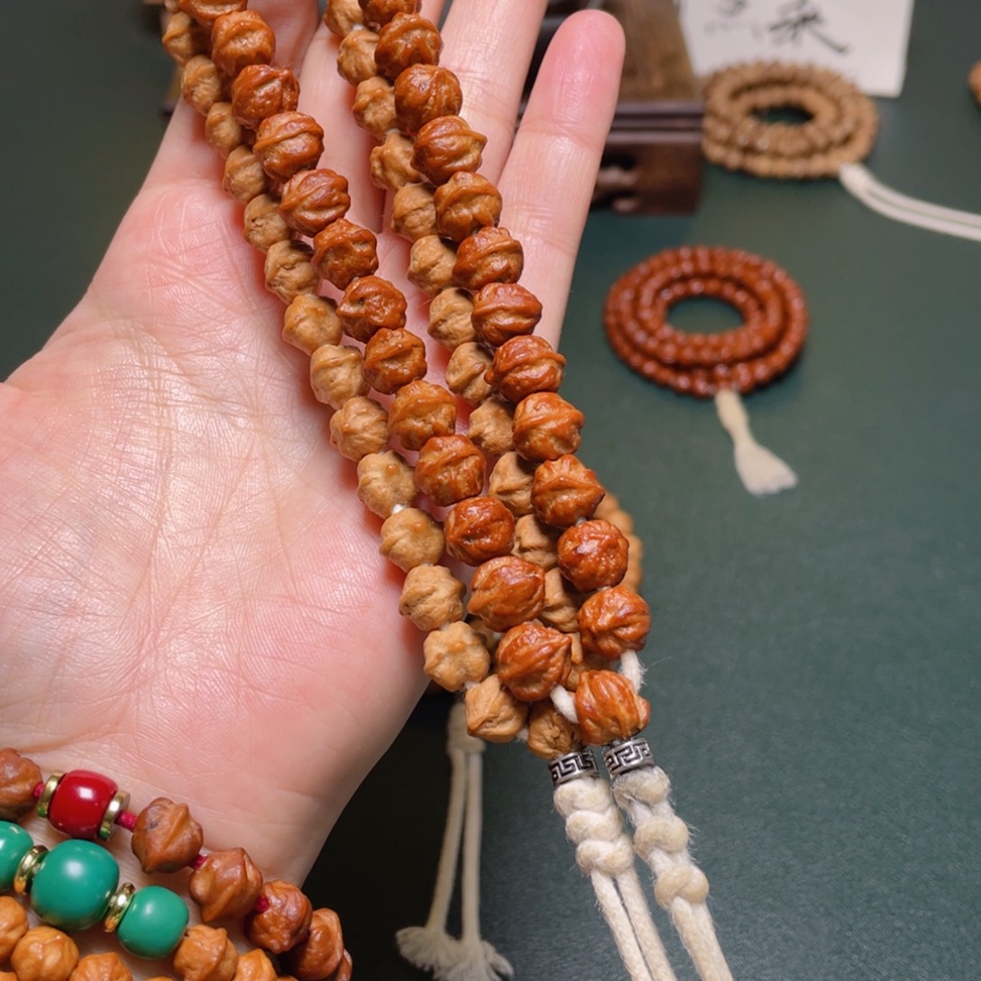 吊坠柏香籽/百香籽白牙横打手持