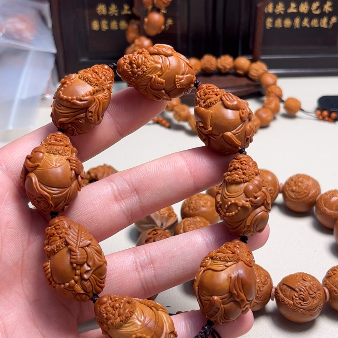 橄榄核吊坠潸**欧整身达摩