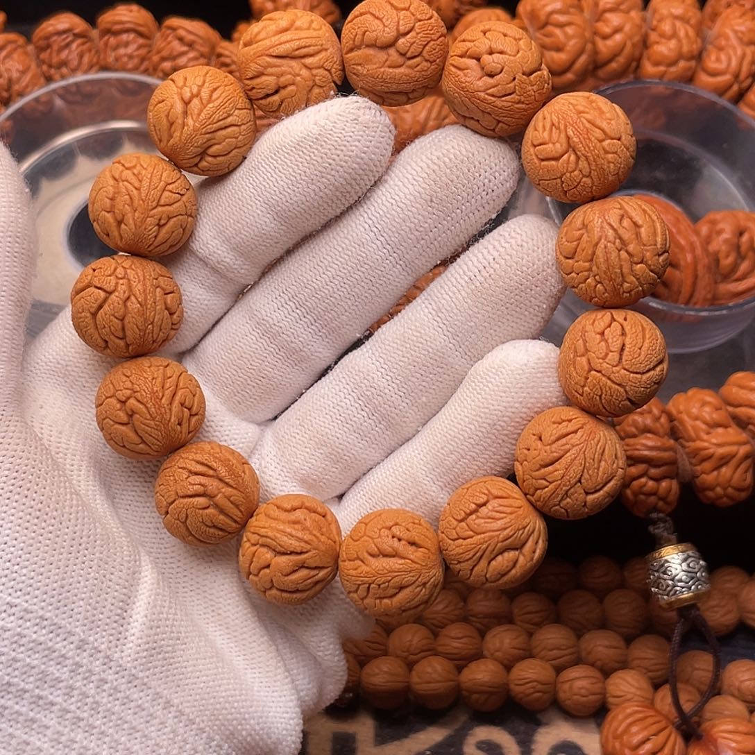 手串桃核金丝龙珠1.6